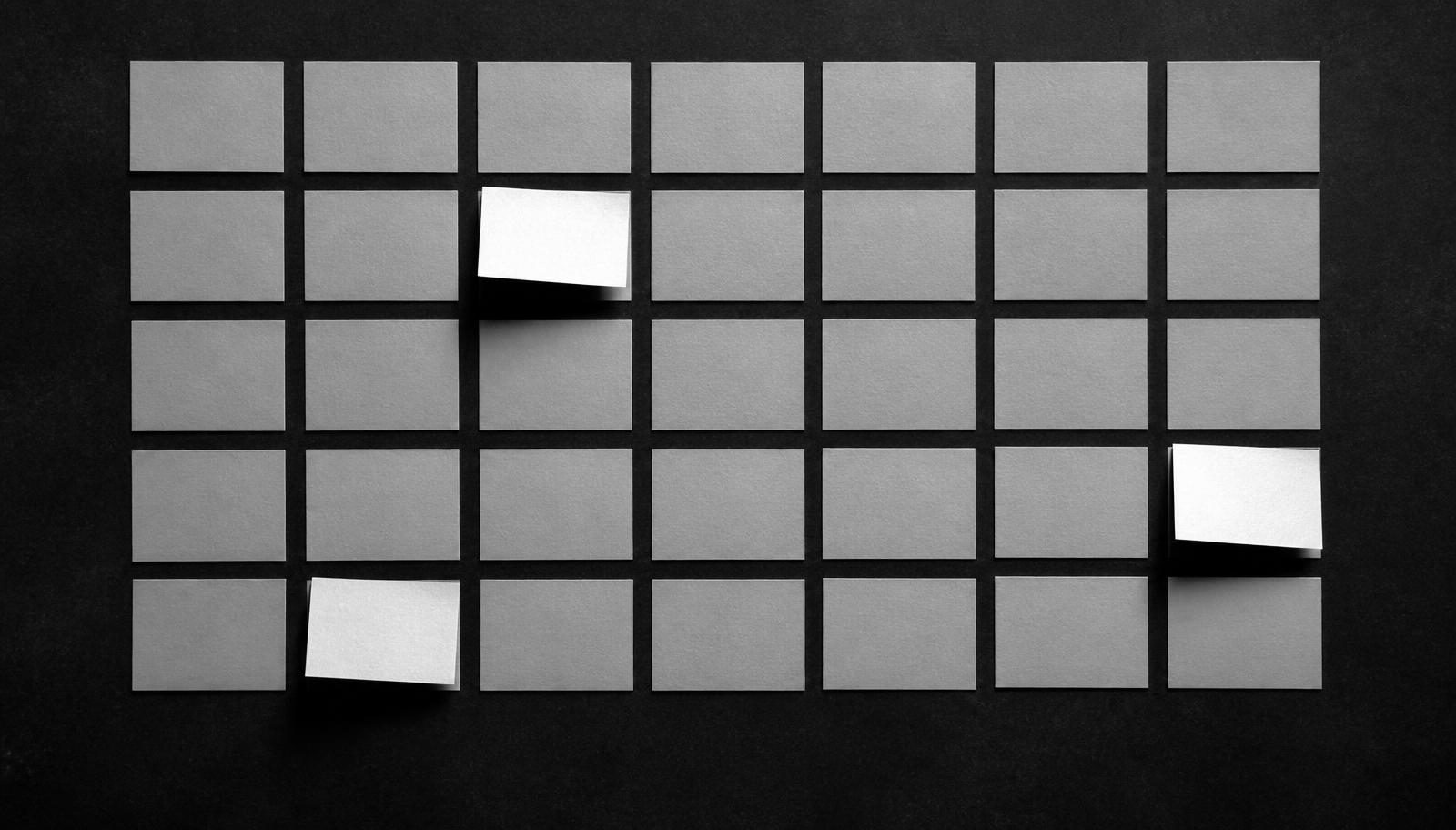 A grid of small tiles, a few of them brighter than the rest