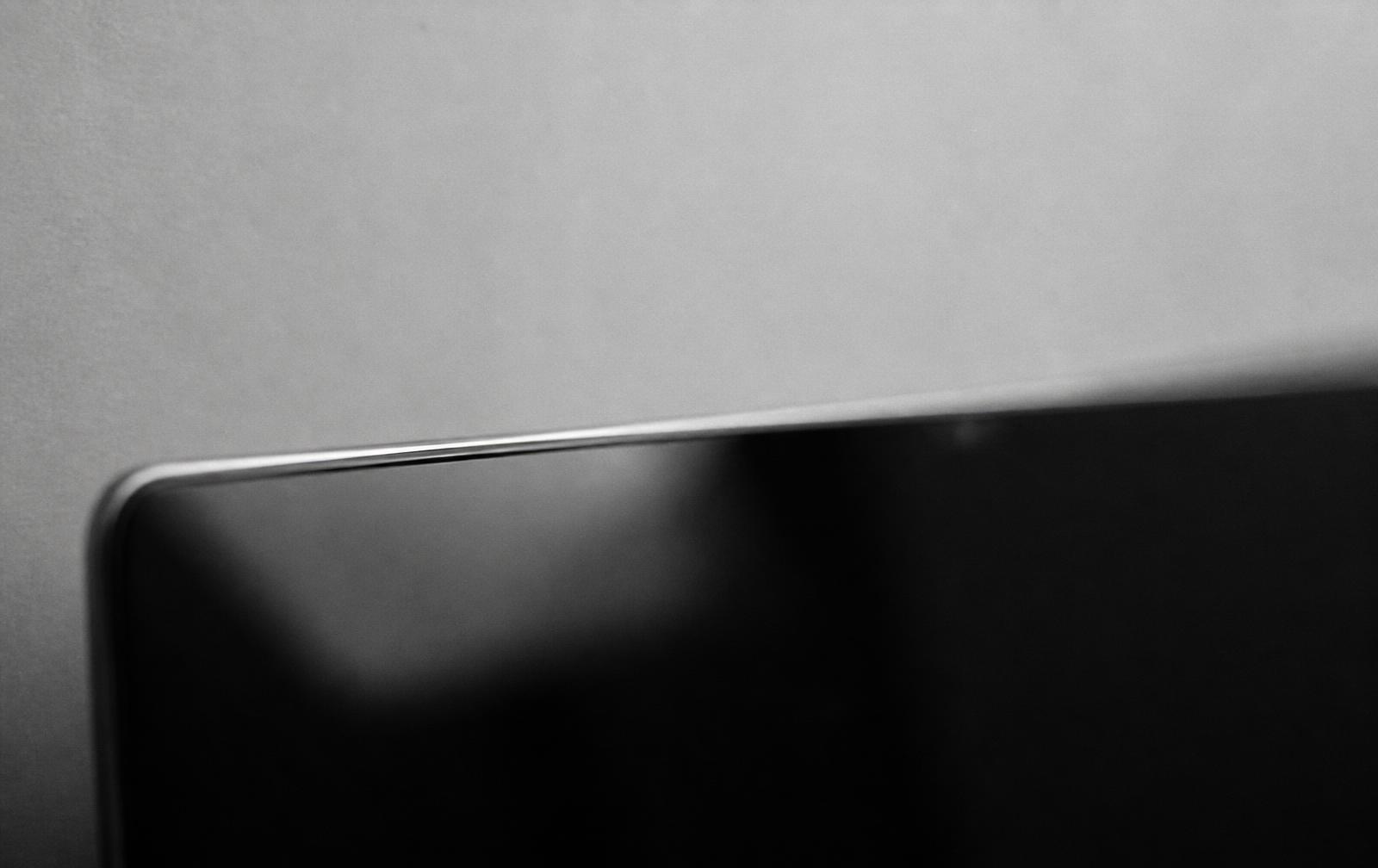 A dark bar of light along the top edge of a screen